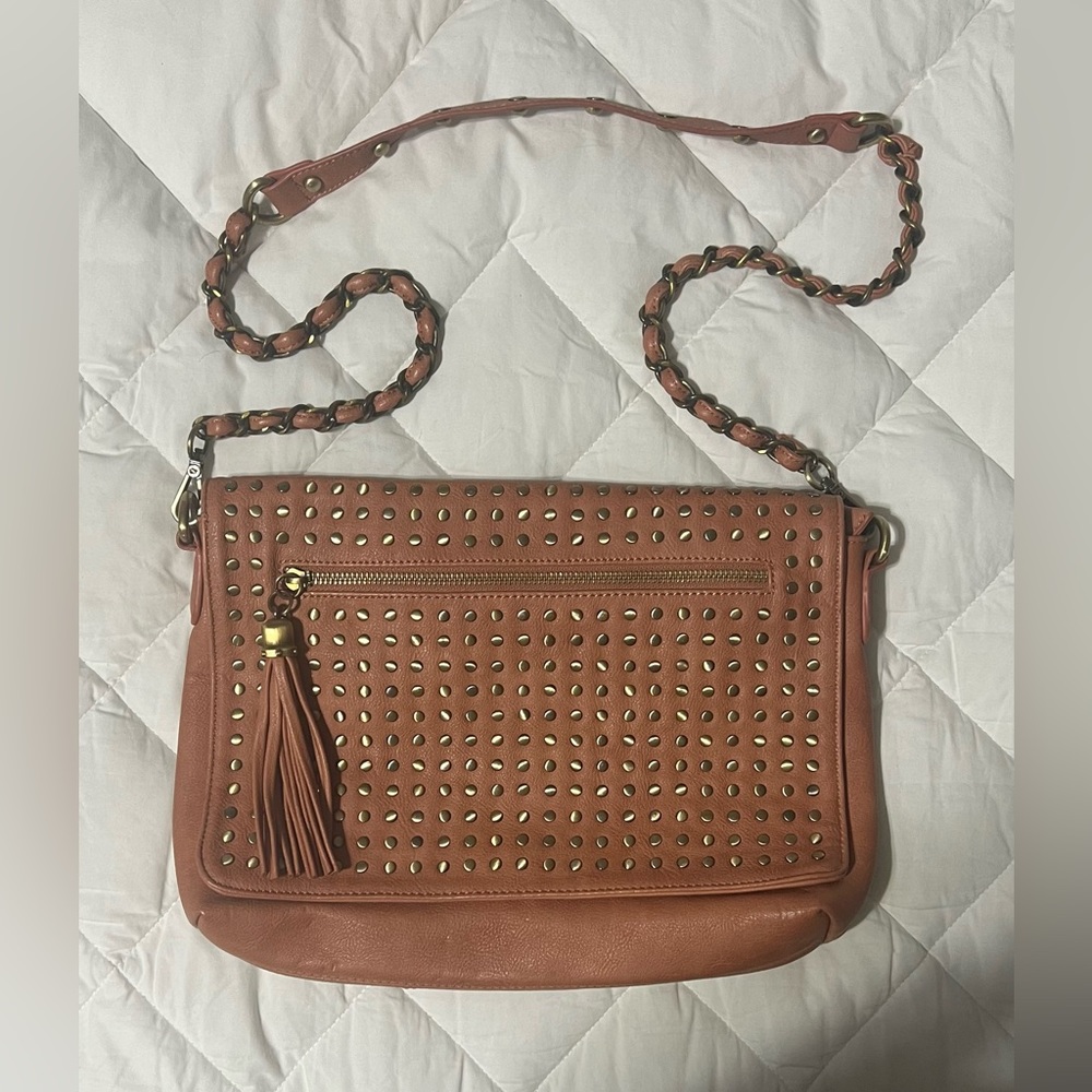 Salmon colored cross body/shoulder bag with gold colored accents. Cross posted.